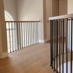 Upper-level flooring and railing renovation