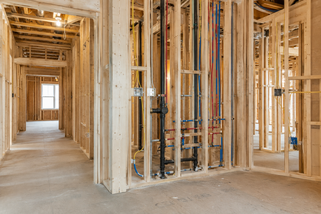 Framing and mechanical rough-ins during a home renovation